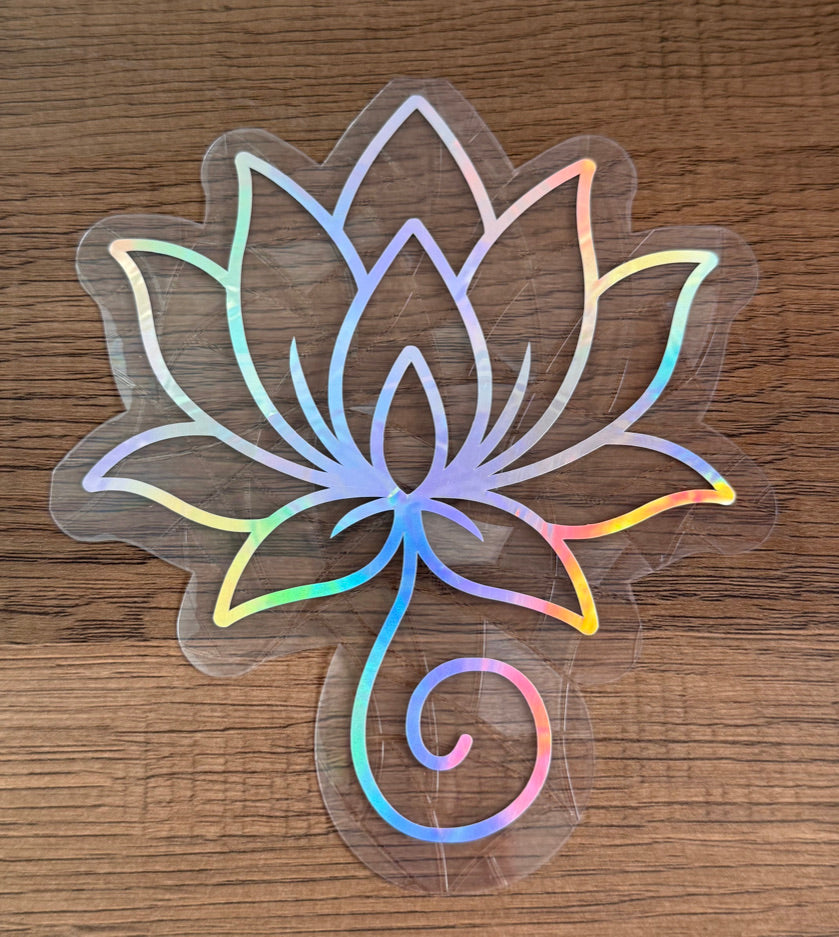 Lotus flower rainbow window cling creating colorful prism reflections on a sunny window