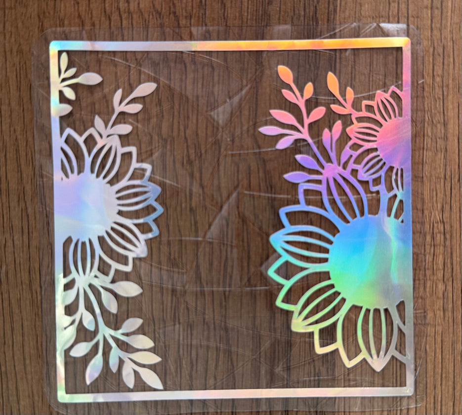 Sunflower corner rainbow window cling creating colorful prism reflections on a sunny window